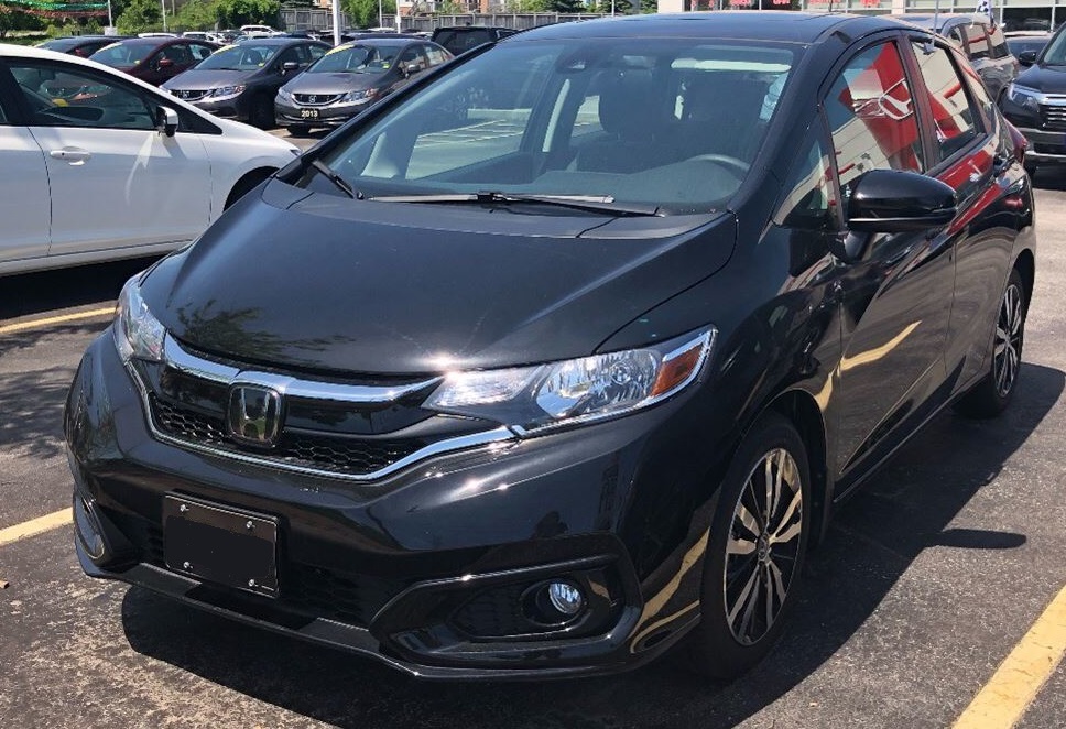 Black 2018 Honda Fit Hatchback Parked in a car lot cheap small car